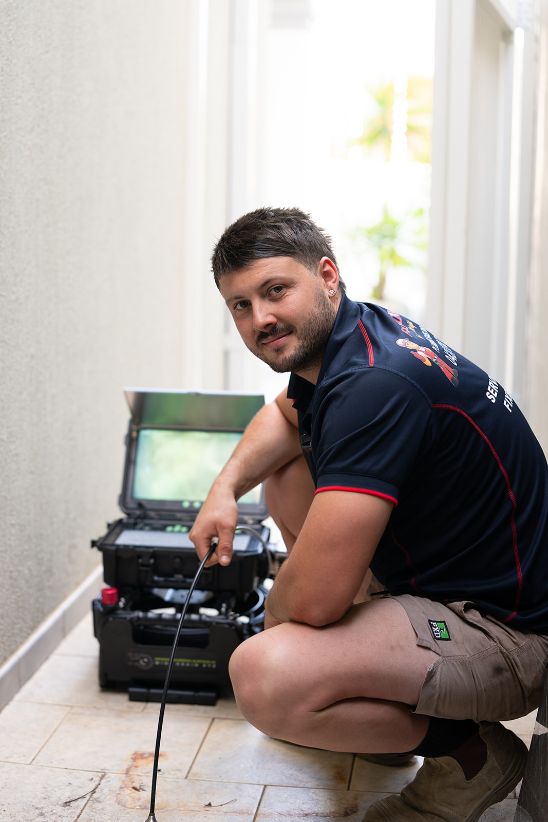 Fixed Today plumber running a CCTV drain camera
