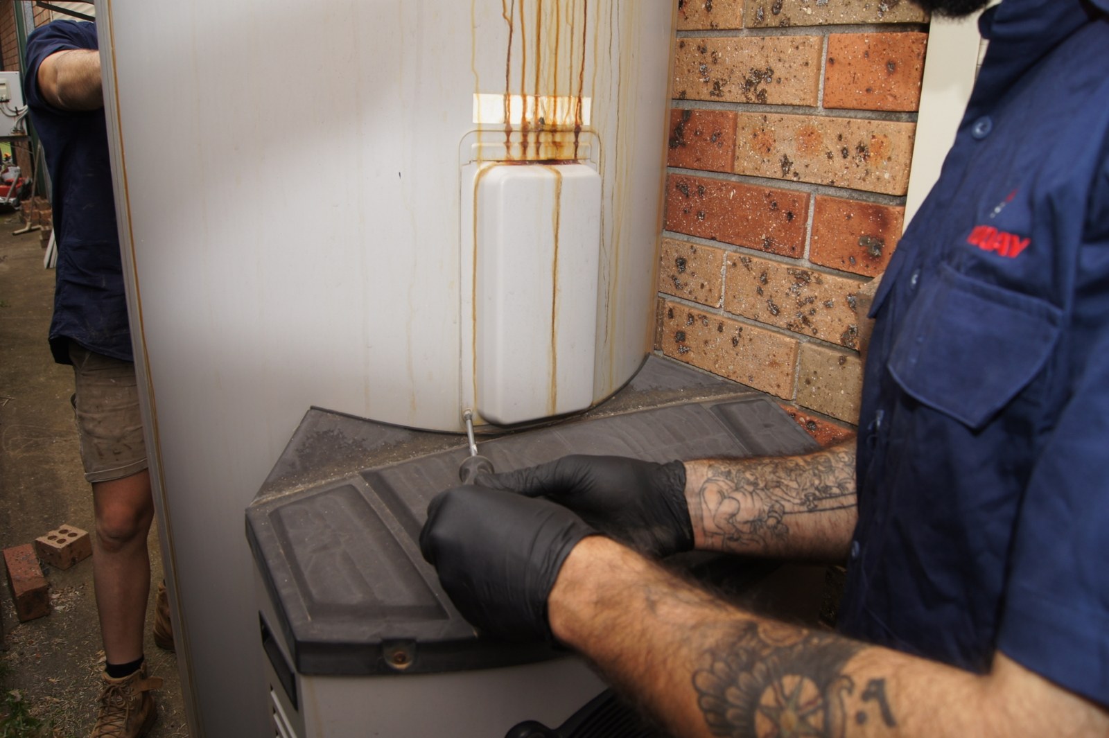 Fixed Today plumber servicing a hot water unit