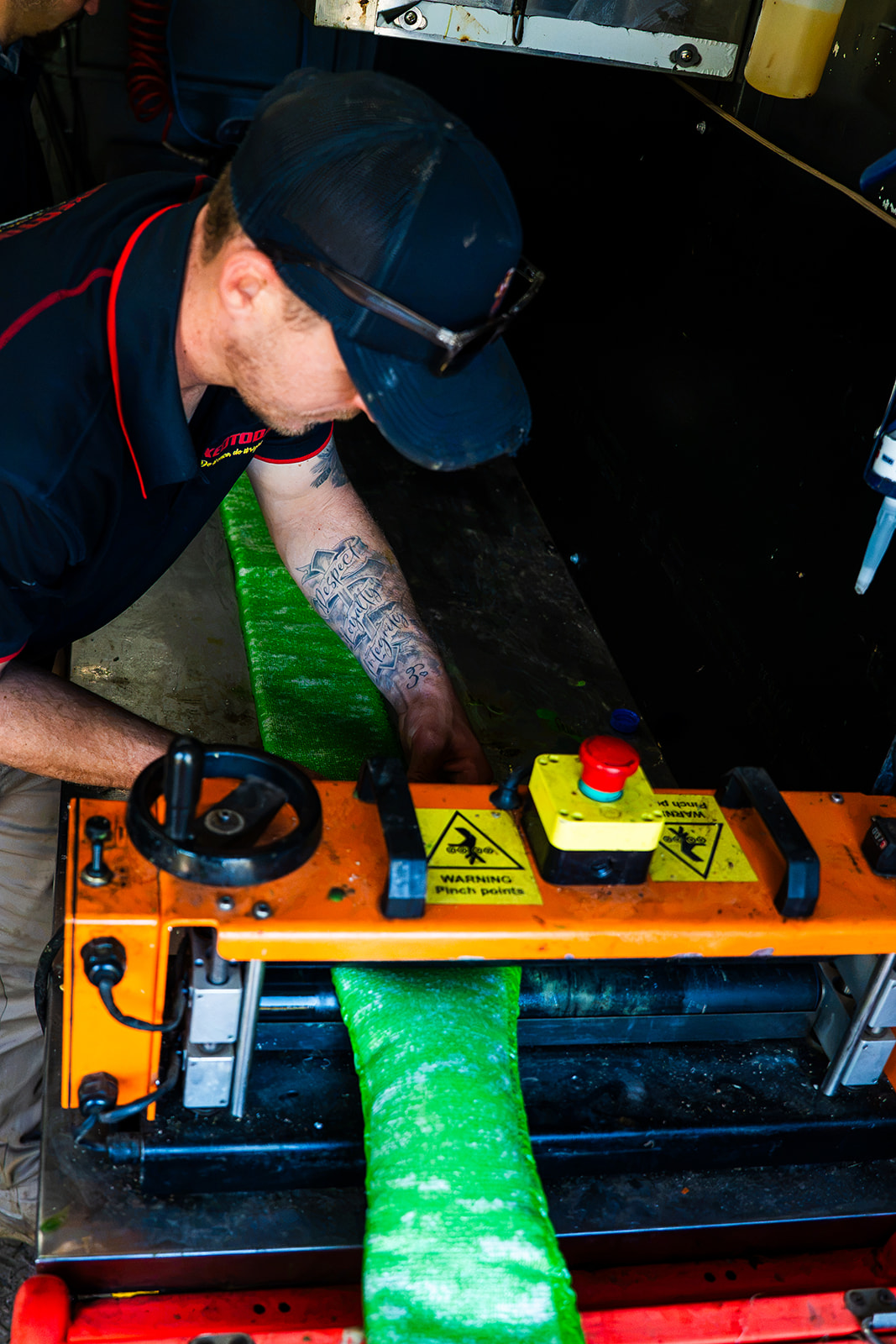 Green pipe relining liner being fed through the inversion machine
